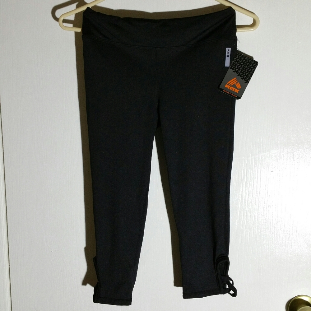 RBX black capri leggings with strappy ankle detail